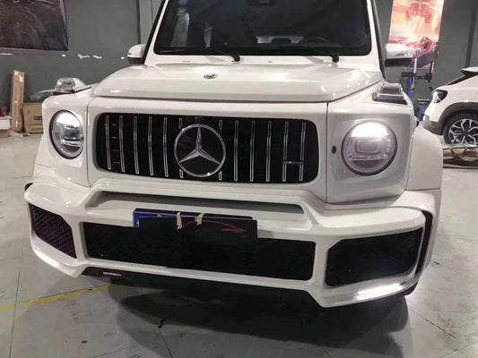 White Mercedes-Benz SUV in an autoshop