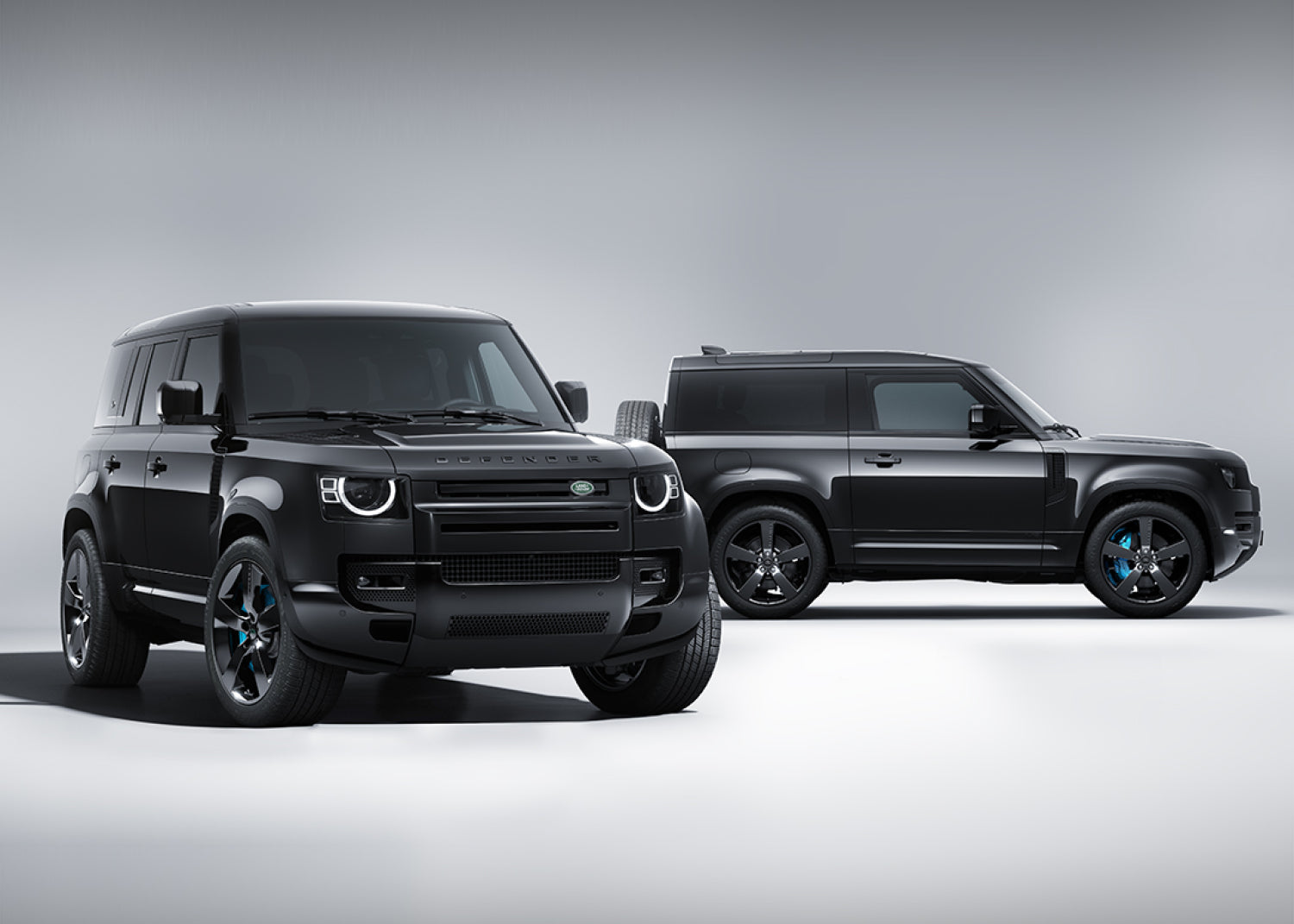 photo of 2 defender 90s of the diagonal view and side view.