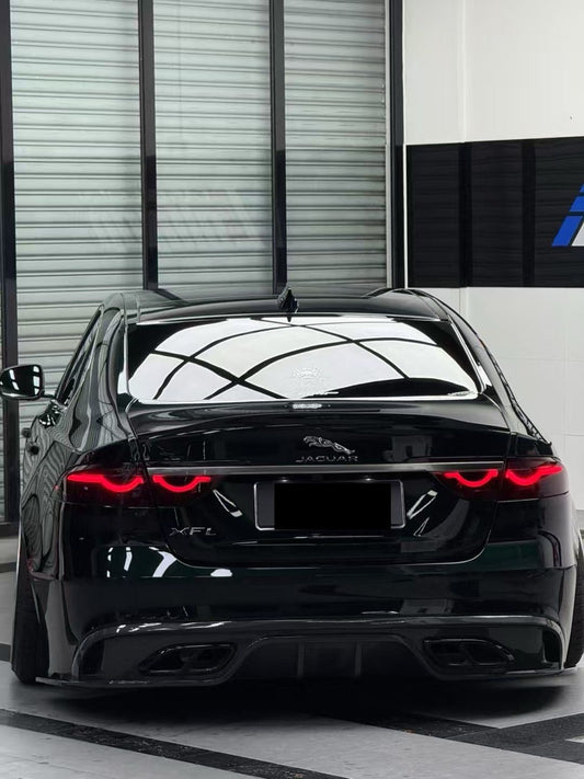 Black Jaguar car in a showroom setting