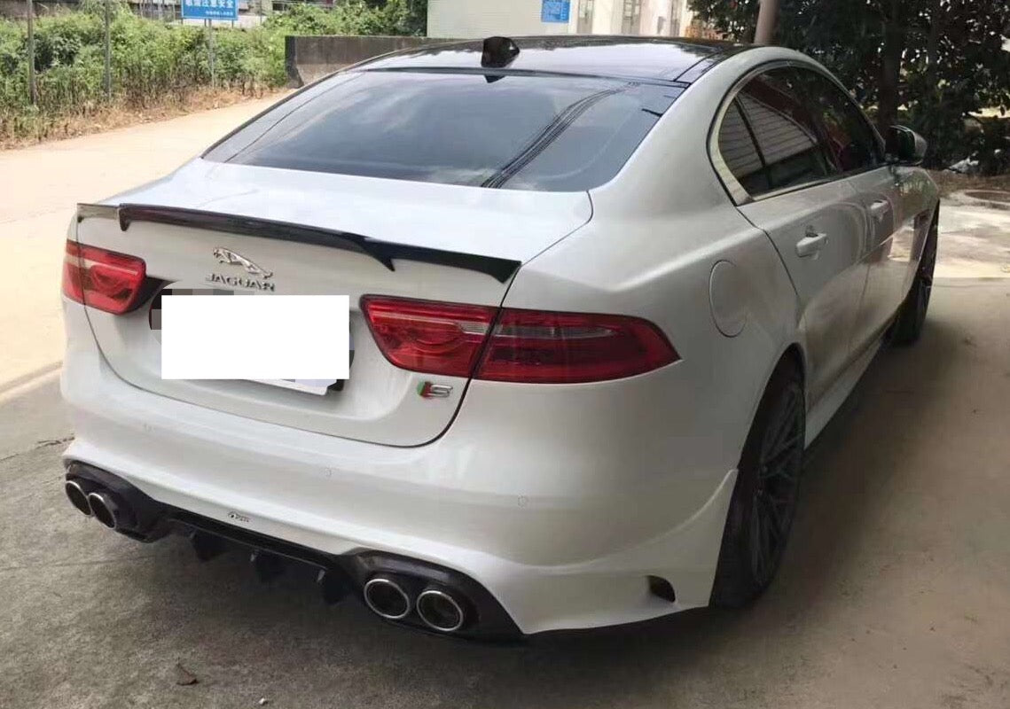 white jaguar with boot spoiler